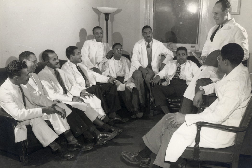 Charles Drew sitting with medical residents at Freedmen's Hospital
