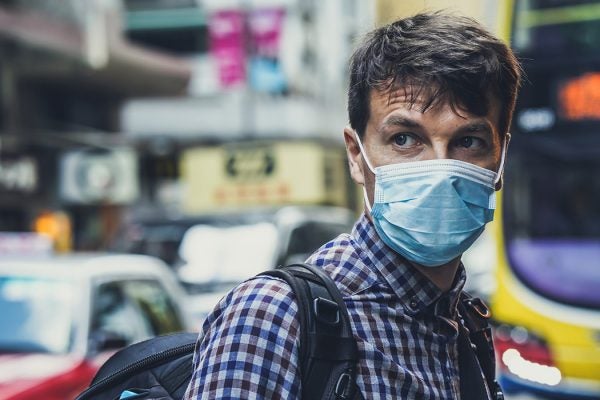 A man wearing a medical mask