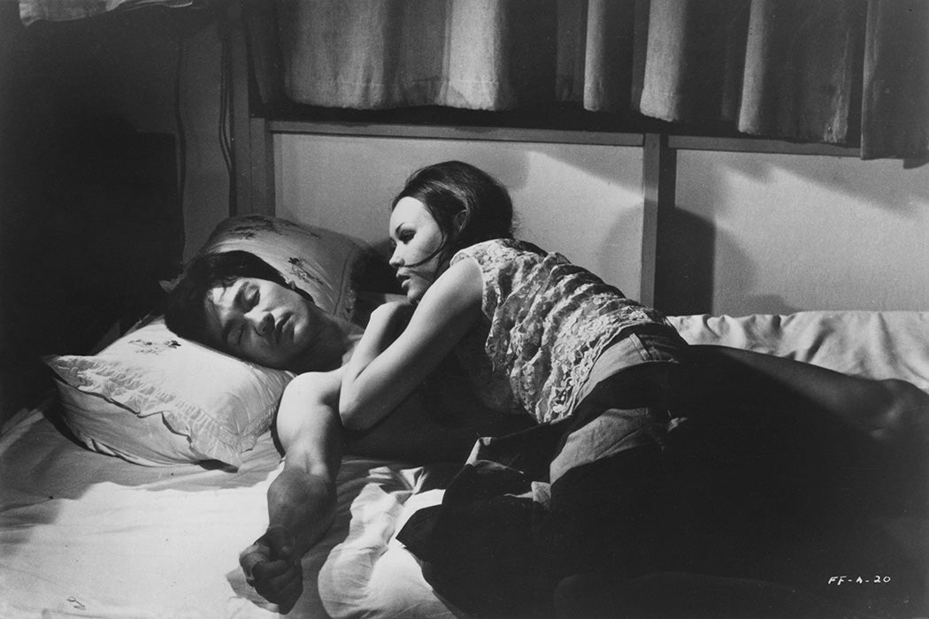 Photo: Bruce Lee and Maria Yi in a scene from the Kung Fu film Fist Of Fury in 1971

Source: Getty