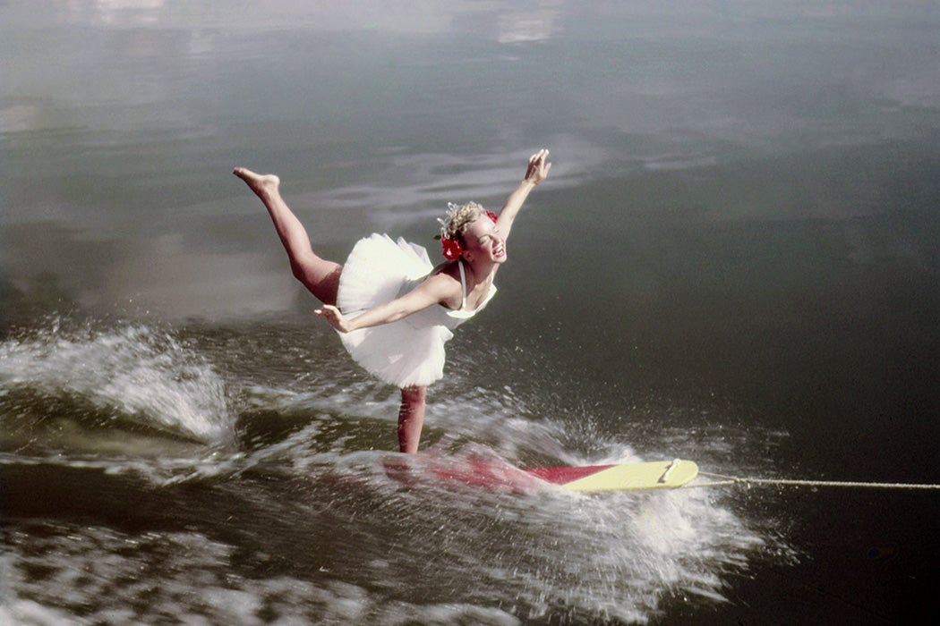 An acrobatic water skier performs during a show at Cypress Gardens theme park in 1953 near Winterhaven, Florida.