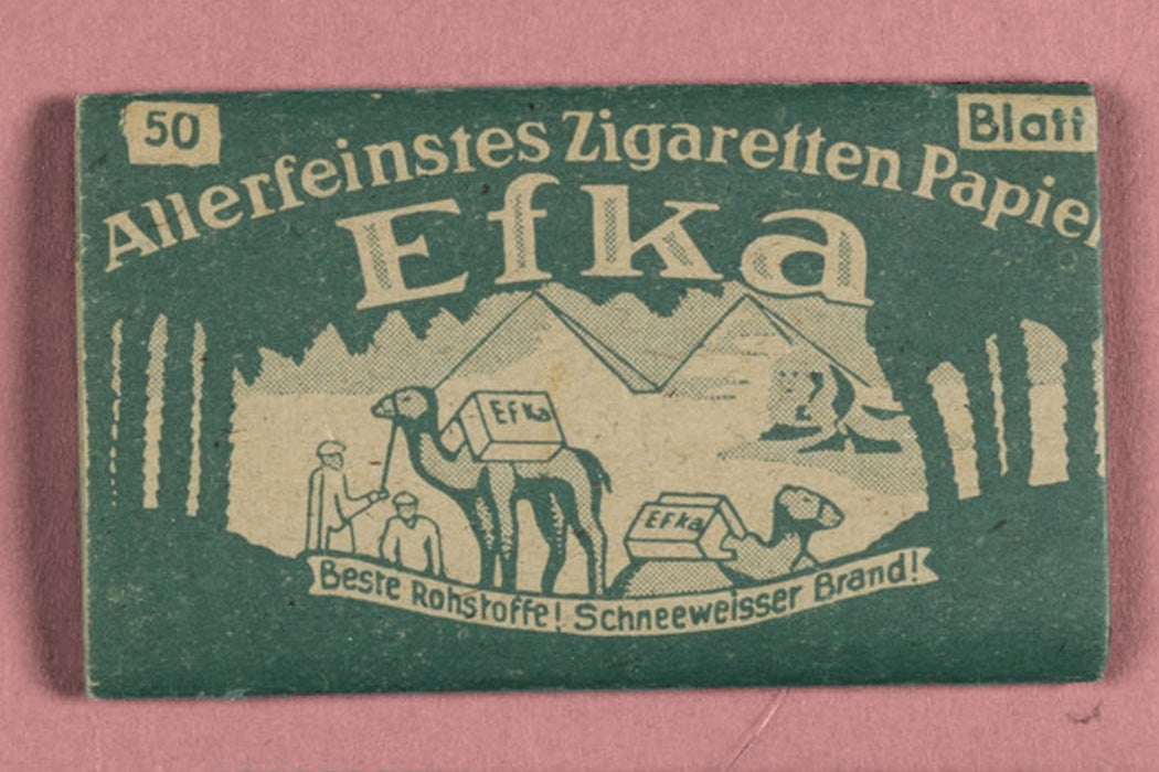 Efka Pyramiden cigarette papers in a green packaging sleeve made in Nazi Germany, Accession Number 2004.705.5