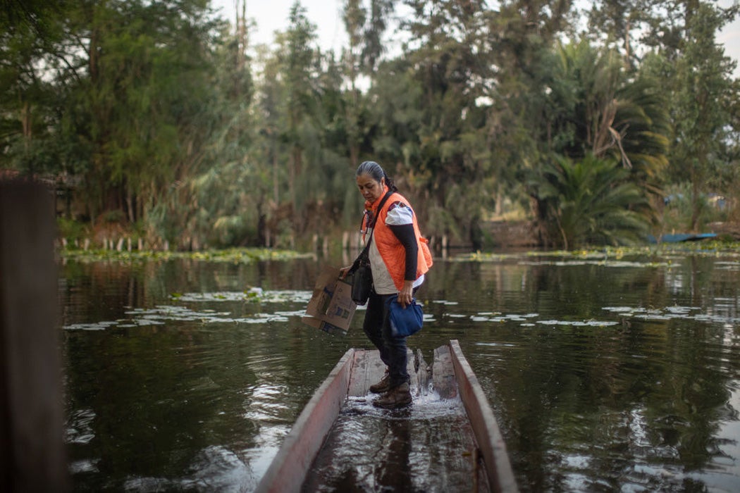 Claudia Zenteno, activist and environmental defender of the Xochimilco wetlands, sails a raft to a chinampa on April 17, 2021 in Xochimilco, Mexico.