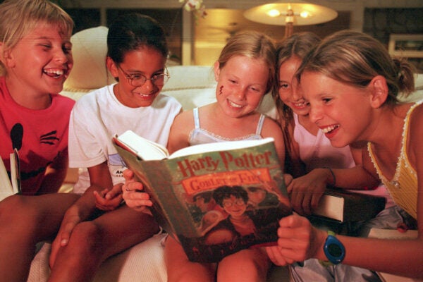 Five children read the new "Harry Potter and the Goblet of Fire" book on July 8, 2000 in El Paso, Texas.