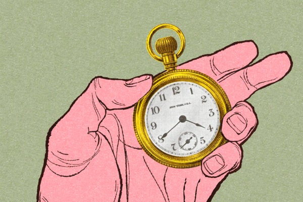 Hand Holding a Pocket Watch