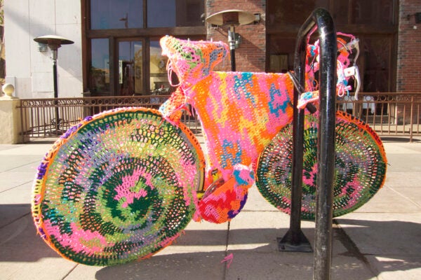 Yarn bombed bicycle on the third street promenade in Santa Monica, presumably by artist OLEK